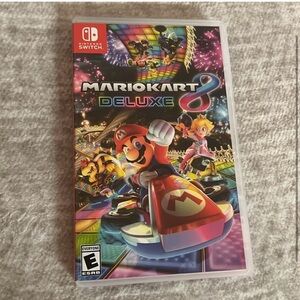 Nintendo switch Mario kart Deluxe 8 for only $24. Comes with case.